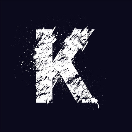 White grunge letter K isolated on dark background. eps10のイラスト素材