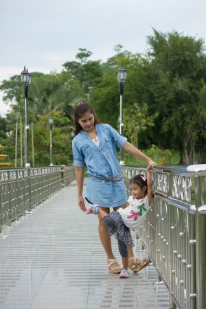 Family on the bridgeの写真素材