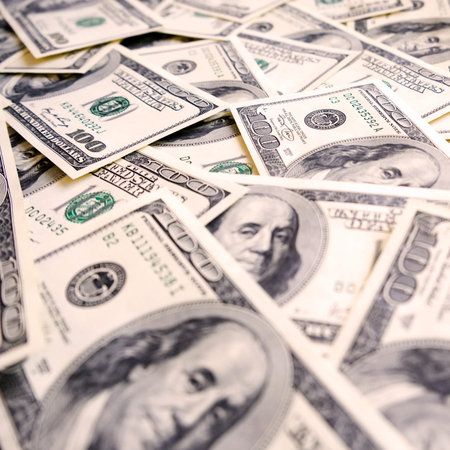 Pile of USA banknotes texture. Heap of american money background. Hundred dollar bills.