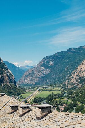 Beautiful landscape in the Aosta Valley mountainous region in northwestern Italy. Alpine valley in summer seen from fort Bard. Hone, Bard, Valle d Aosta.の写真素材