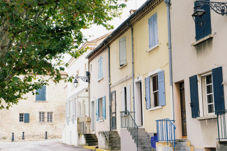 Arles, France - September 2019: view of beautiful colorful buildings and narrow streets in Arles. Popular travel destination in Southern France.のeditorial素材