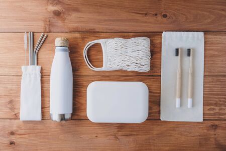 Stylish reusable eco friendly items on wooden background.の写真素材