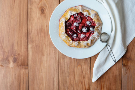 Delicious freshly baked vegan strawberry and cherry galette.