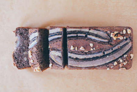 Freshly baked homemade gluten free banana bread cake with walnuts. Sweet food. Popular american dessert.の写真素材