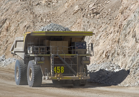 Haul truck carries waste rock in the Chuquicamata copper mineの写真素材