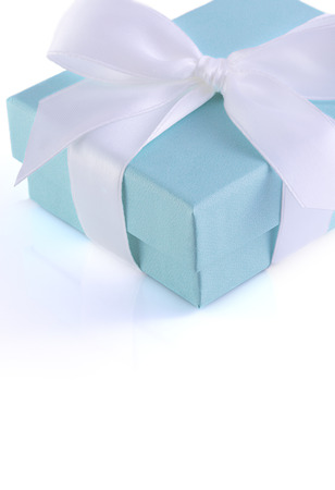 Small gift box with white ribbon isolated の写真素材