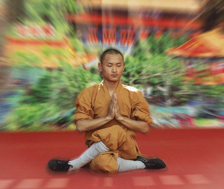 HONG KONG - MAY 3  Unidentified monk of Shaolin temple performs wushu at Po Lin monastery on May 3, 2014 in Hong Kong, China  Group of Shaolin monks do no-charge show to promote chinese martial arts のeditorial素材