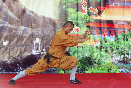 HONG KONG - MAY 3  Unidentified monk of Shaolin temple performs wushu at Po Lin monastery on May 3, 2014 in Hong Kong, China  Group of Shaolin monks do no-charge show to promote chinese martial arts のeditorial素材
