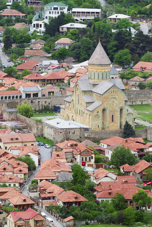 Aerial view of Mtskheta city, old capital of Georgia, with famous Svetitskhoveli Cathedral  It is the seat of Georgian archbishopの写真素材
