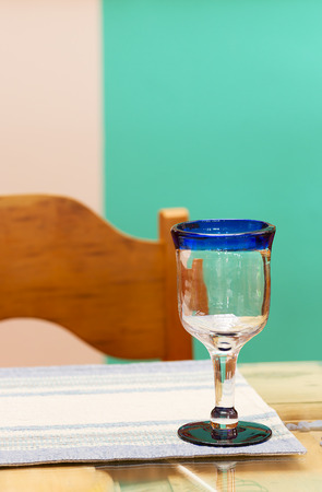 Empty wine glass on a tableの写真素材