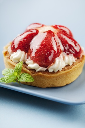 tart with fresh cream and strawberriesの写真素材