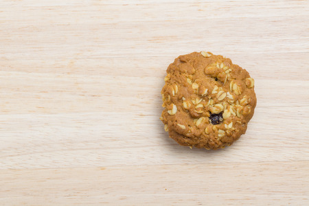 Whole wheat cookies on wood background.の写真素材