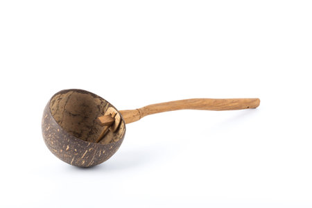 coconut shell ladle on white backgroundの写真素材