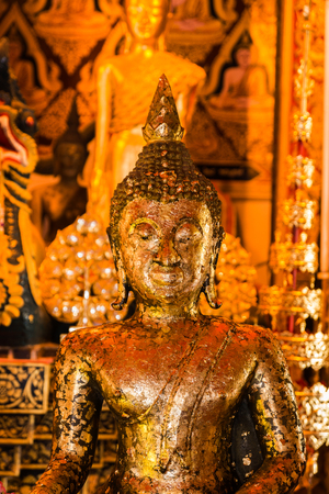 Golden Buddha statue at temple Nan, Thailandのeditorial素材