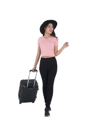 Woman traveler with suitcase on white background.の写真素材