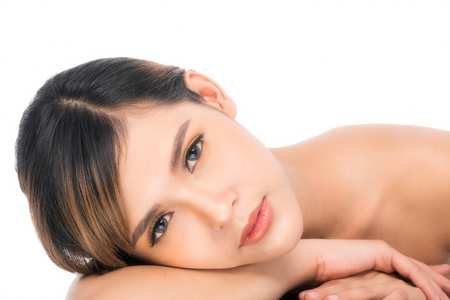 Beautiful Young Woman(Asian girl 20-30 years old) with clean fresh skin on white background.の写真素材