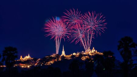 Beautiful colorful fireworks festival over the Phra Nakhon Khiri Historical Park on mountain in night time at Phetchaburi, Thailandの写真素材