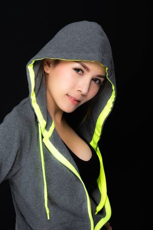 Fitness sport women in fashion sportswear fitness exercise isolated on black background.の写真素材