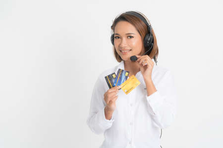 Portrait young engineer woman is submitting ideas about plans and projects, while holding blueprints and a pen in hand at shot studio isolated on white background.の写真素材