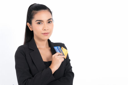 Portrait young engineer woman is submitting ideas about plans and projects, while holding blueprints and a pen in hand at shot studio isolated on white background.の写真素材