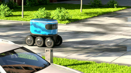 Autonomous delivery robot drives along the streetの写真素材