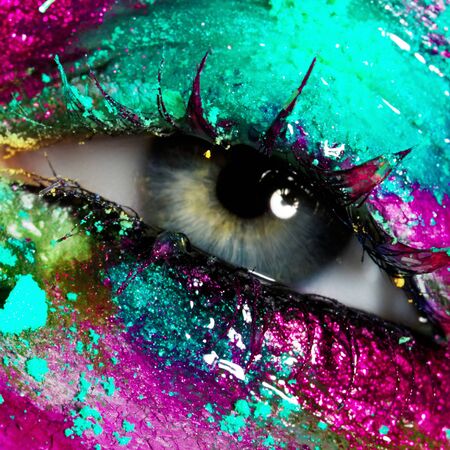 Beauty, cosmetics and makeup. Bright creative make-upの写真素材