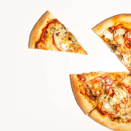 Pizza Margherita just mozzarella and tomato sauce with some fresh basilの写真素材