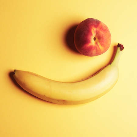 Flat lay. Top view. Peaches on a bright backgroundの写真素材