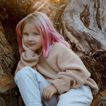 Portait Of Smiling Young Girl Outdoors. happy fall girl smiling joyful outside in colorful fall...