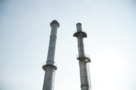The Smokestacks with  sky backgroundの写真素材