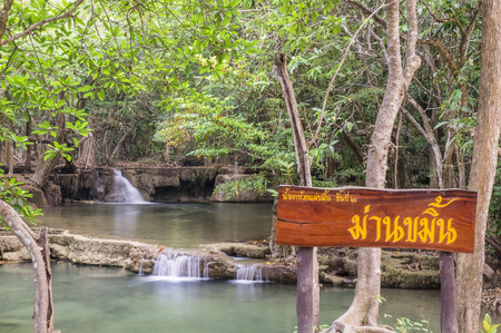 Huai Mae Khamin Waterfall. Thai language on broad is name of 2nd floor of Huai Mae Khamin Waterfall.のeditorial素材