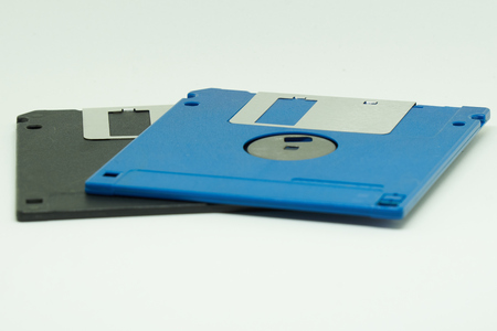 Floppy disks or diskette in white background. It is is a type of disk storage composed of a disk.の写真素材