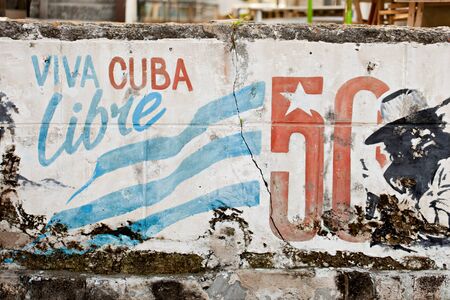 VARADERO, CUBA - DECEMBER 23, 2011: Viva Cuba Libre graffiti in a cityのeditorial素材