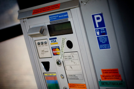 HELSINKI, FINLAND - OCTOBER 29, 2008: Ship in a sea: Payment machine in parking area in a city
