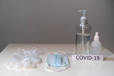 Sanitizer antiseptic, mask and glovesfor clean hands. Epidemic pandemic hygieneの写真素材