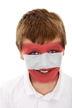 Young boy with austria flag painted on his faceの写真素材