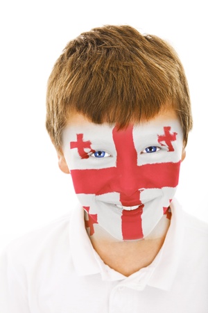 Young boy with georgia flag painted on his faceの写真素材
