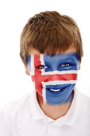 Young boy with iceland flag painted on his faceの写真素材