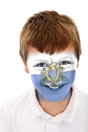 Young boy with san marino flag painted on his faceの写真素材