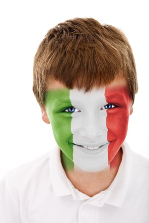 Young boy with  italy flag painted on his faceの写真素材