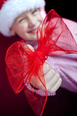 bow on christmas boyの写真素材