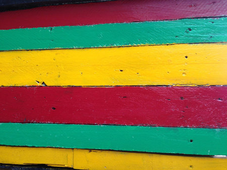The background or texture is made of multi-colored wood. Reggae color, Red, green, yellow and blackの写真素材