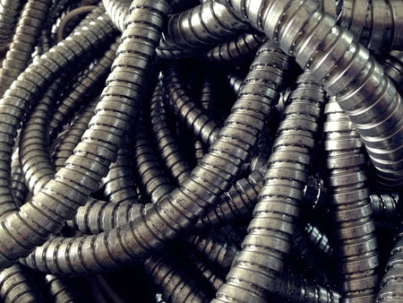 Flexible Metal Conduit, Made of galvanized steel sheet both inside and outside. The tube is weak. Bendableの写真素材