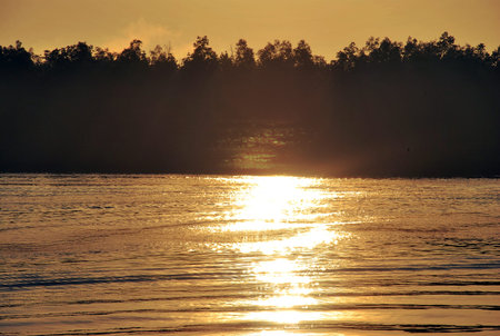 In the midst of nature and river, whether it be the sunrise in the morning or the light of the sunset in the evening, it is always beautiful.の写真素材