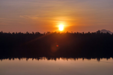In the midst of nature and river, whether it be the sunrise in the morning or the light of the sunset in the evening, it is always beautiful.の写真素材