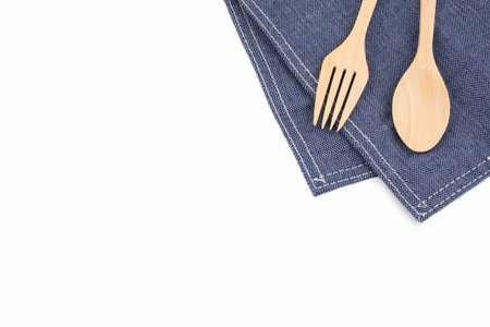Spoon, Fork and Napkin isolated on white backgroundの写真素材