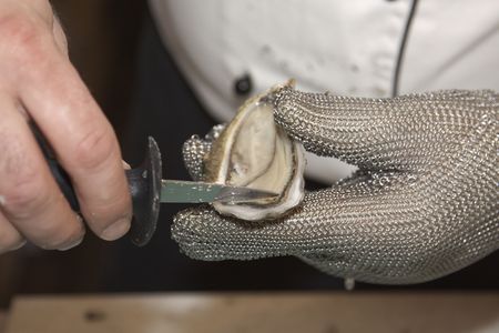 fresh oysters and cook with a knifeの写真素材
