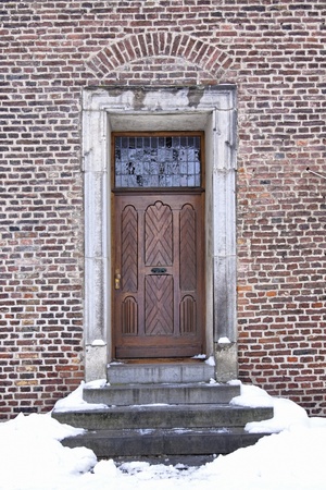 Old door in the winterの写真素材