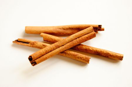 cinnamon roll on a bright white table backgroundの写真素材