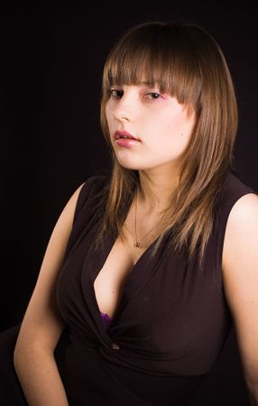 Young girl in a black dressの写真素材